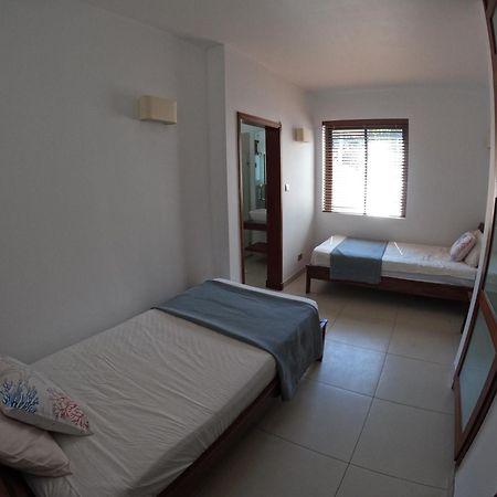 Olana Blue - Beachfront Apartment Rivière Noire Екстериор снимка