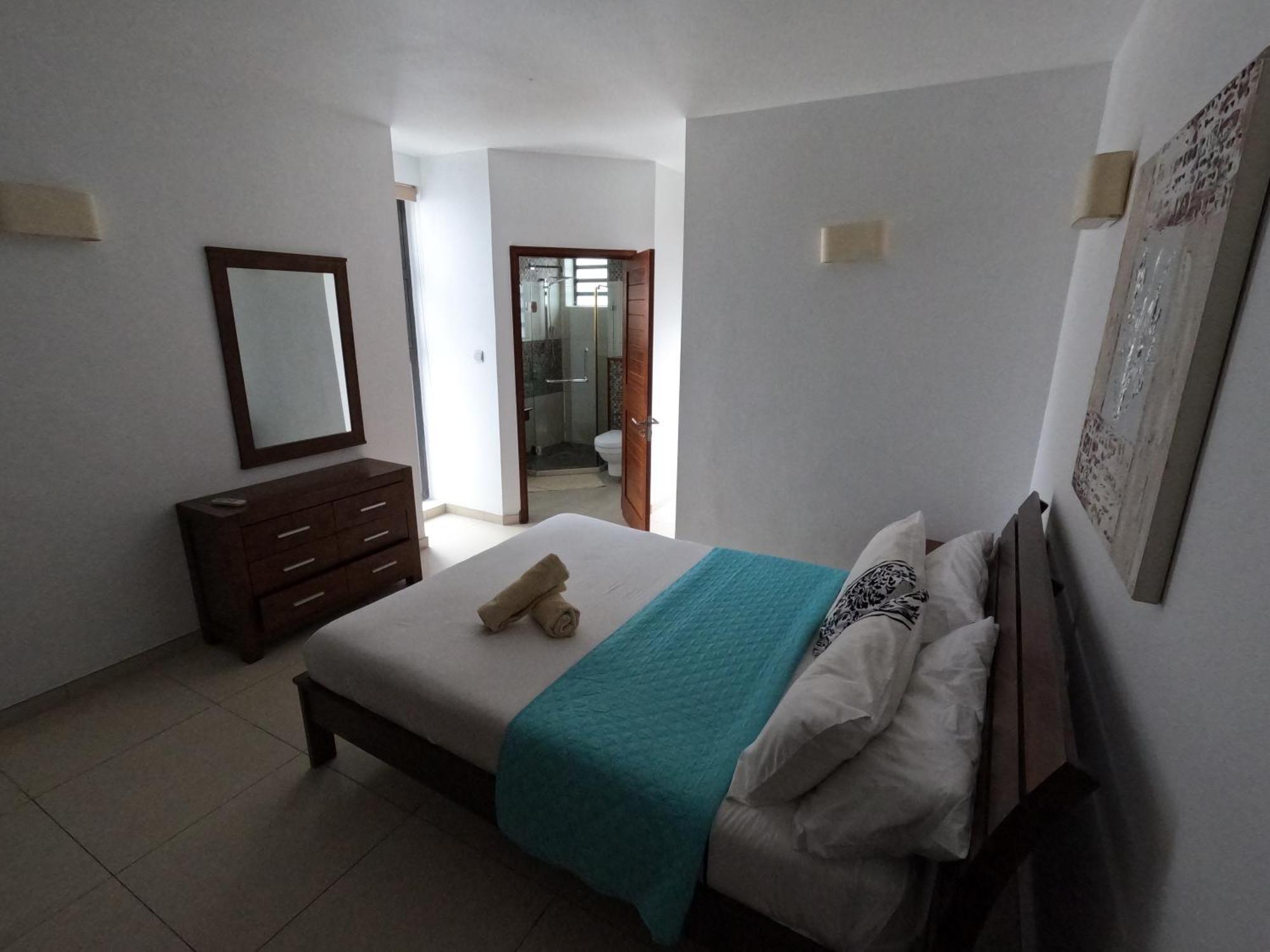Olana Blue - Beachfront Apartment Rivière Noire Екстериор снимка